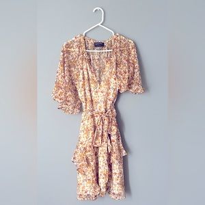Mink Pink floral mini in size L